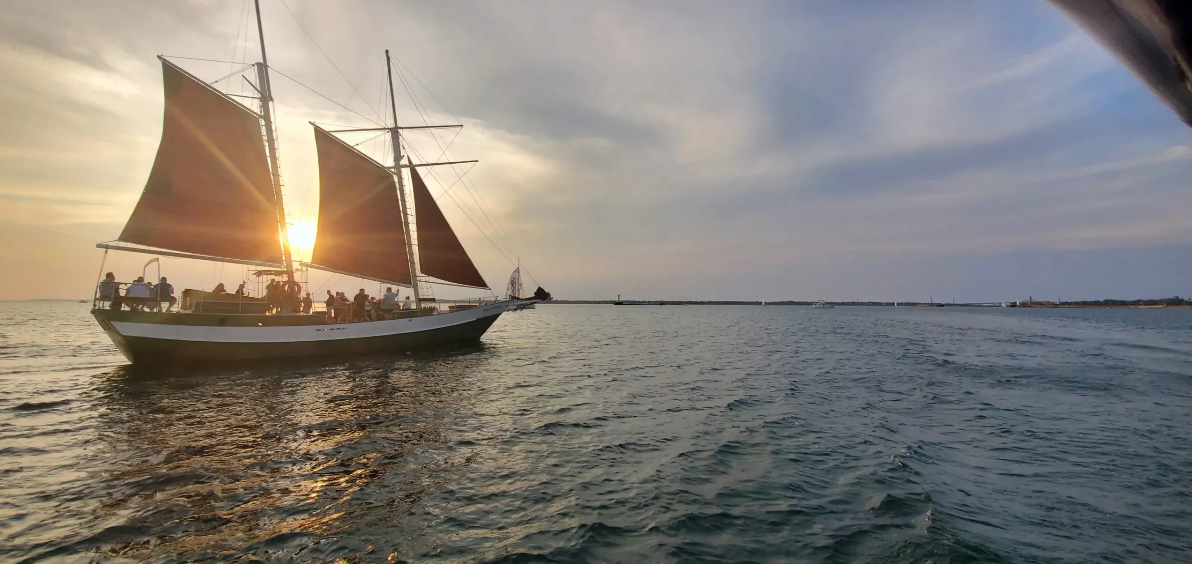 Spirit of Buffalo sailing at sunset on Lake Erie